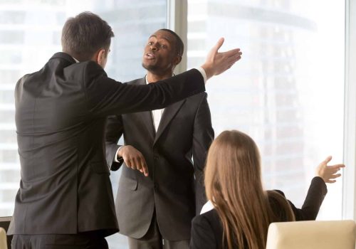 Ambitious african american male candidate insisting on getting a job, male and female caucasian recruiters asking quarrelsome applicant to leave office. Failed interview, conflict at work or dismissal